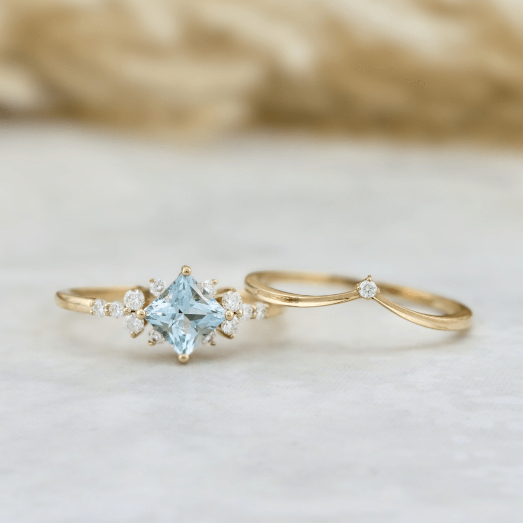 Bagues Ensemble d'alliances Moissanites et Topaze bleu princesse