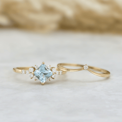 Bagues Ensemble d'alliances Moissanites et Topaze bleu princesse