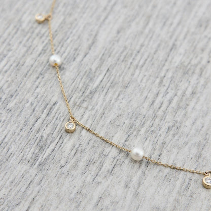 Collier en or 14K serti de diamants et perles